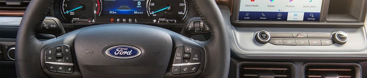 exterior of a silver 2025 Ford Maverick truck showing the front and passenger side in McMinnville, OR
