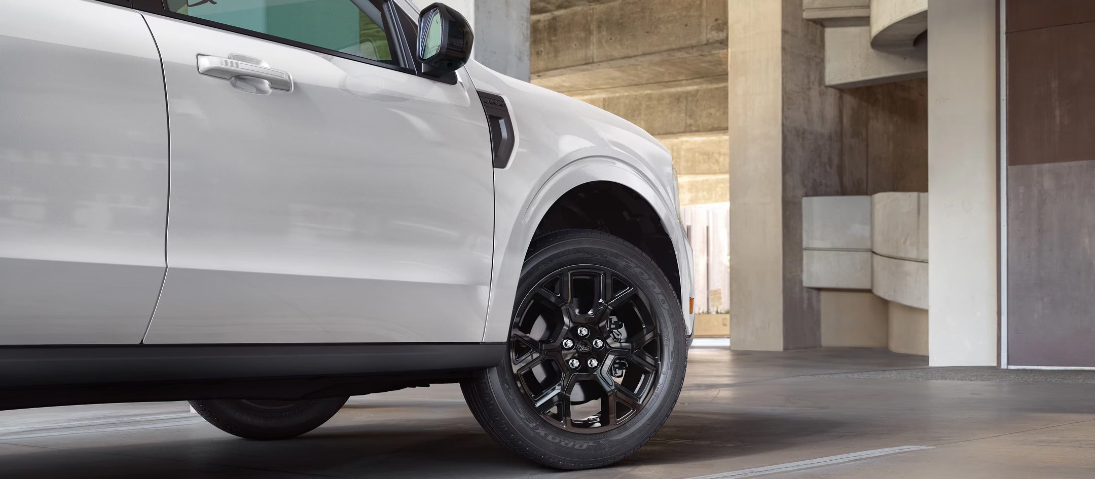 interior of a 2025 Ford Maverick showing the steering wheel and instrument panels